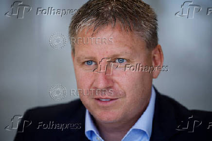 FILE PHOTO: Azul Linhas Aereas Brasileiras CEO John Rodgerson speaks during an interview in Sao Paulo
