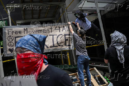 Protest against federal immigration sweeps, in Chicago
