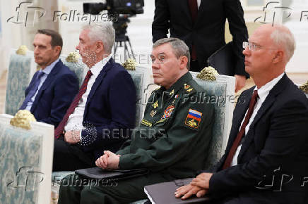 Russian President Vladimir Putin holds a meeting with members of Russia's top leadership in preparation for the upcoming Russia-US summit, in Moscow