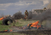 Young recruits of the Ukrainian Armed Forces attend an exercise in Kyiv region