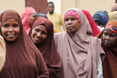 People have their biometrics recorded during voter registration, in Mogadishu