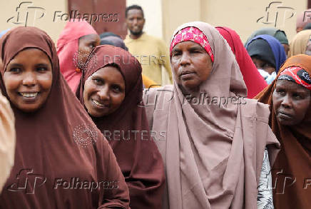 People have their biometrics recorded during voter registration, in Mogadishu