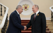 Russian President Putin greets foreign leaders before parade marking WW2 victory anniversary in Moscow