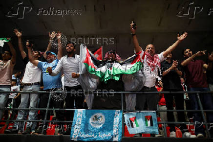 Jordanians celebrate a goal against Oman, as Jordan qualified for World Cup for the first time after 3-0 win over Oman, in Amman, Jordan June 5, 2025. REUTERS/Alaa al Sukhni