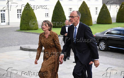 Designated chancellor Friedrich Merz on his way to receive his certificate of appointment