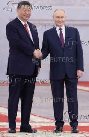 Russian President Putin and Chinese President Xi meet in Moscow