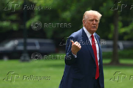 U.S. President Donald Trump arrives at the White House on Marine One from Camp David, in Washington
