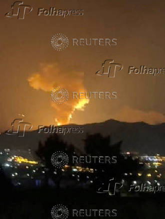 Smoke rises in the direction of Khojir complex as the Israel-Iran air war continues, in Tehran