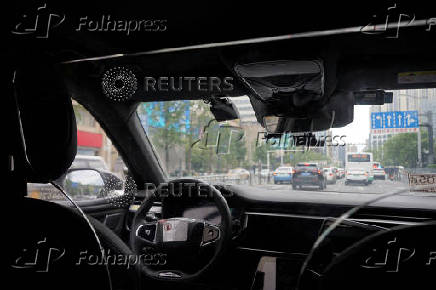 FILE PHOTO: Apollo Go robotaxi service in Wuhan