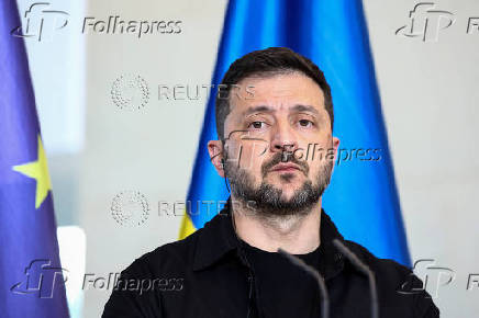 German Chancellor Merz speaks to the media, in Berlin