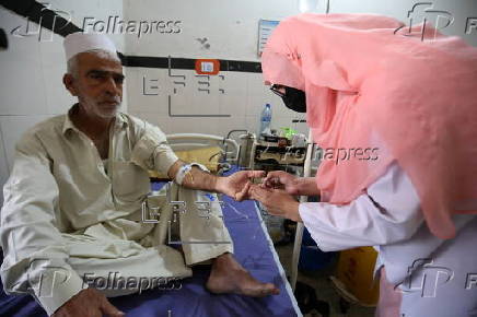 Patients receive treatment on World Diabetes Day in Peshawar