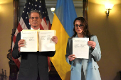 U.S. Treasury Secretary Bessent and Ukrainian First Deputy Prime Minister Svyrydenko sign a deal in Washington