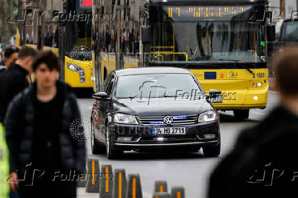 A vehicle approaches the Turkish Presidency's Dolmabahce working office, in Istanbul