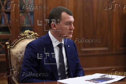 Russian President Vladimir Putin meets with Sports Minister Mikhail Degtyarev