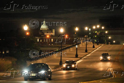 Traffic moves along the 11th street bridge with the U.S. Capitol building in the background, as seen from the Anacostia neighbourhood, in Washington, D.C