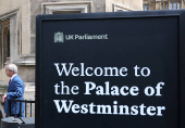 Britain?s Reform Party leader Farage walks into Houses of Parliament in London