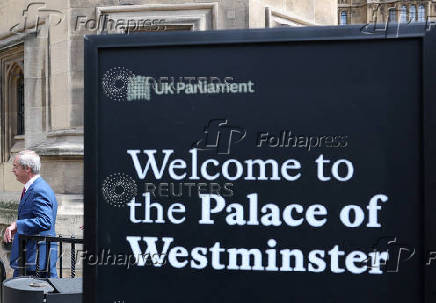 Britain?s Reform Party leader Farage walks into Houses of Parliament in London