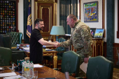 Ukraine's President Zelenskiy and Head of the Security Service of Ukraine Maliuk shake hands during their meeting in Kyiv