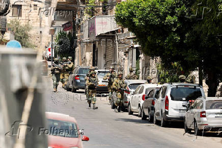 Israeli soldiers take part in a Israeli raid in Nablus