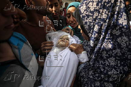 Mourning the dead at Al Shifa hospital