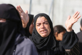 Aftermath of an early morning Israeli strike on a tent sheltering displaced people, in Khan Younis