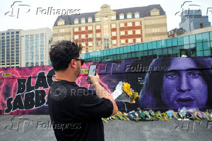 Fans pay tribute following the death of Ozzy Osbourne, in Birmingham