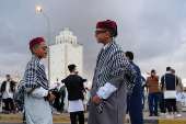 People gather to celebrate Eid wearing traditional Libyan outfits in Benghazi