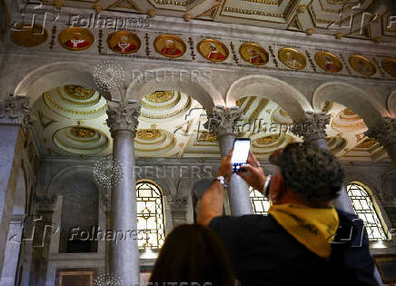 A mosaic depicting the late Pope Francis is displayed inside the Basilica of Saint Paul Outside the Walls