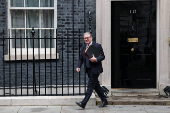 British Prime Minister Keir Starmer leaves 10 Downing Street in London