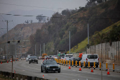 Cars drive along Pacific Coast Highway, in Los Angeles