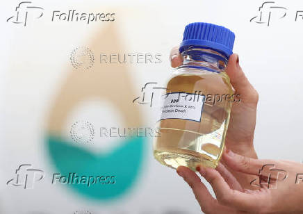A bottle of B20 biodiesel is displayed at Sepang
