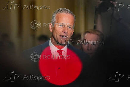U.S. Senate Majority Leader John Thune talks to reporters on Capitol Hill