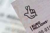 Photo illustration of EuroMillions lottery ticket