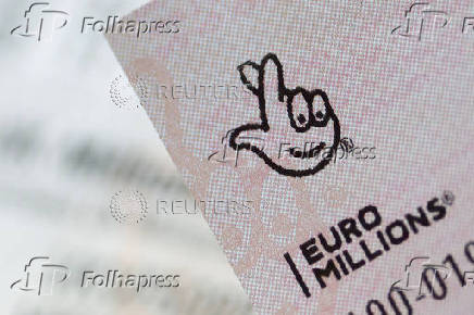 Photo illustration of EuroMillions lottery ticket