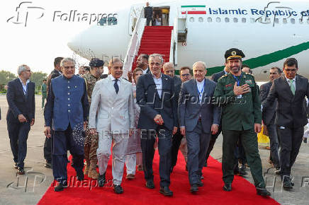 Iranian President Pezeshkian is welcomed by Pakistani PM Sharif in Islamabad