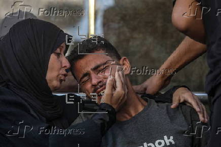 Palestinians mourn family killed in Israeli airstrike on Gaza refugee camp