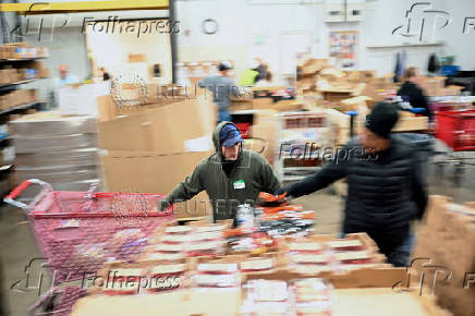 Food pantry is busy, weeks into the continuing U.S. government shutdown, in Commerce City