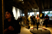 Visitors explore installations at the 