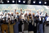 Supporters of Islamic organization Jamiat Ulema-e-Islam rally in Lahore in solidarity with Palestinians