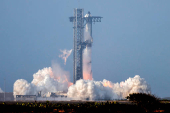 SpaceX's next-generation Starship spacecraft atop its Super Heavy booster is prepared for launch