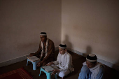 Students read the Koran at a madrasa in Multan