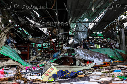 A house damaged by Cambodia's shelling is pictured in Sisaket province, ahead of a ceasefire talks in Malaysia on the deadly border conflict between Thailand and Cambodia