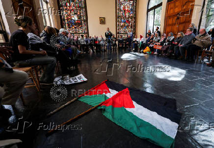 Cape Town activists hold vigil in solidarity with journalists in Gaza