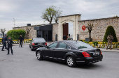 Vehicles arrive at the Turkish Presidency's Dolmabahce working office, in Istanbul