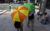 Demonstrators gather during a 