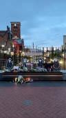 Flowers are kept on the Black Sabbath bench, as a tribute to Black Sabbath's late Ozzy Osbourne, in Birmingham