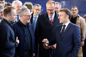 Emmanuel Macron, Keir Starmer and Friedrich Merz arrive at Kyiv railway station