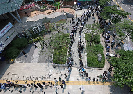 People cast early votes for the upcoming presidential election