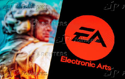 FILE PHOTO: A smartphone with the Electronic Arts logo is seen in front of a displayed character from the Battlefield 2042 game in this illustration
