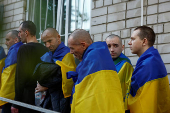 Ukrainian prisoners of war are seen after they return after a swap in an undisclosed location in Ukraine